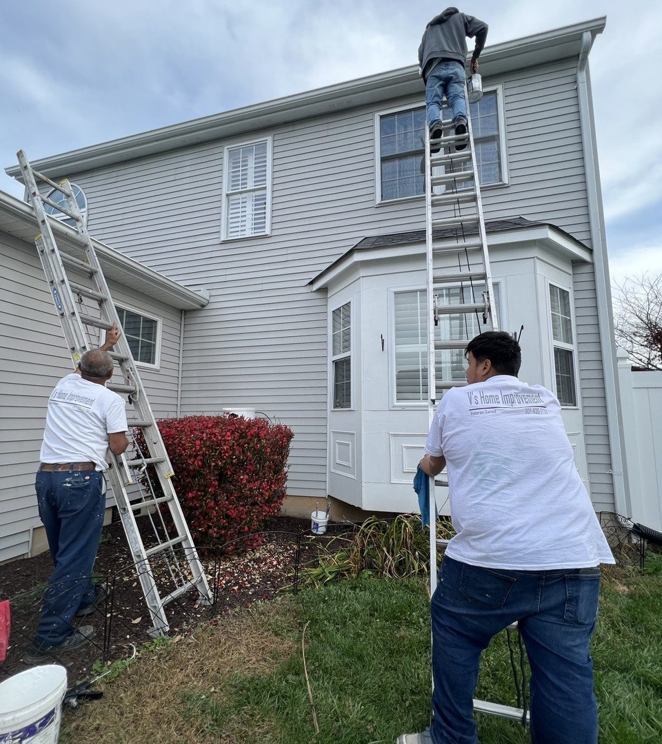 Exterior house painting job with the team