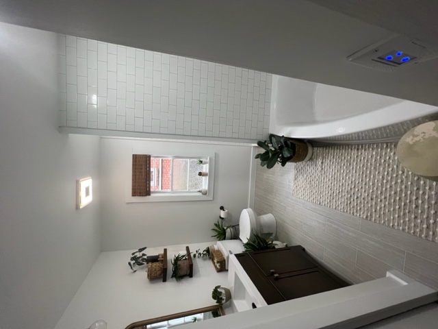 Bathroom remodel: Bathtub, shower, tiles, paint, and fixtures